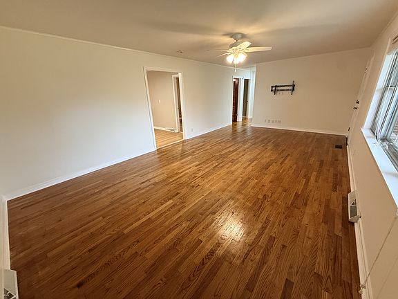 Spacious Living Room - check out the TV hook ups under the TV mount!