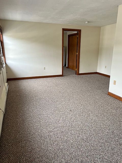 Living room facing towards bedroom
