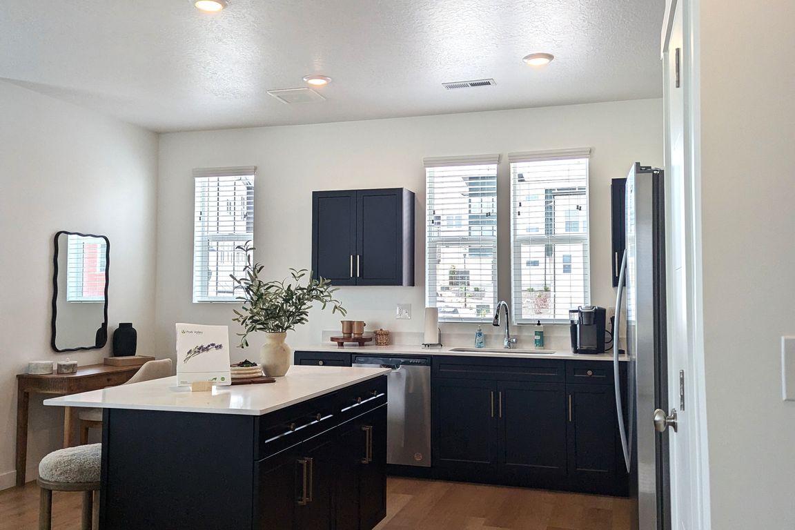 Kitchen with dark cabinets