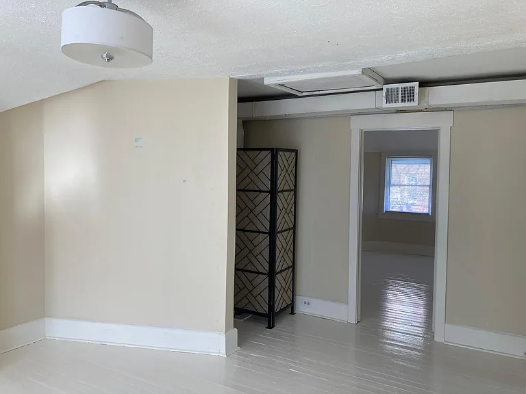 Living Room to Hall to Side Bedroom