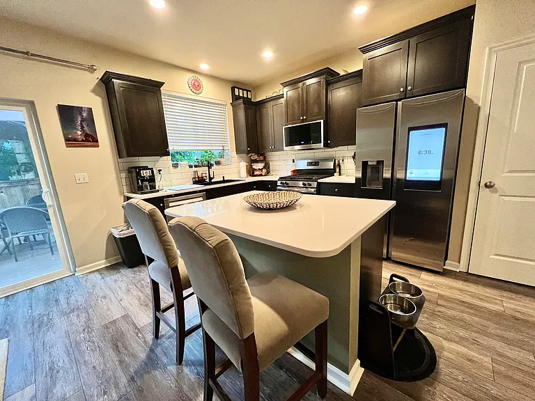 Kitchen. All stainless steel appliances. Smart dishwasher and smart fridge.