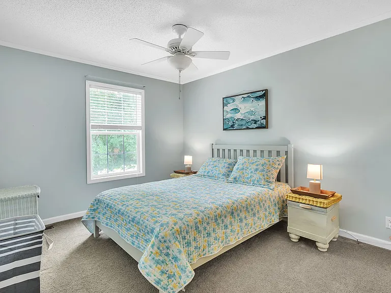 Bedroom 2 with a queen-sized bed and a dresser (not shown)