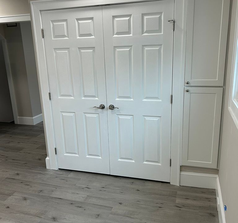Double door pantry in eat-in kitchen