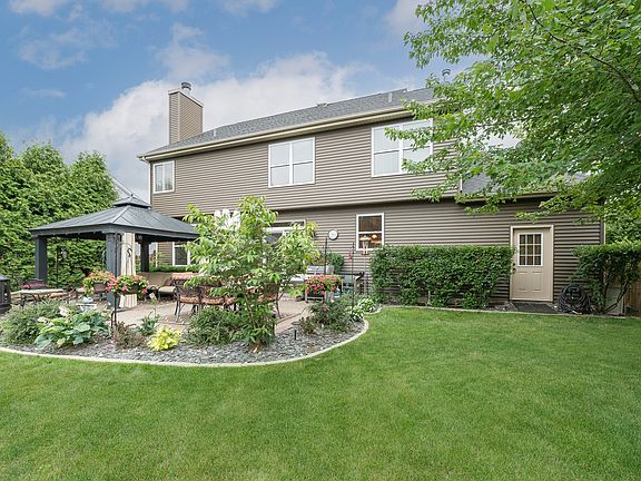 Be still my heart! You are gonna love this privacy fenced yard that is also edged in arbovitaes crea