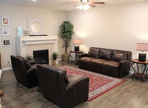 Warm an inviting living room complete with gas fireplace, perfect for those chilly NW nights.