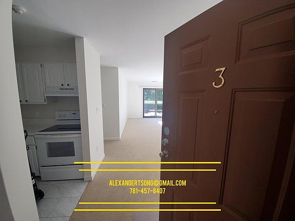 Front door opens to the kitchen and living area