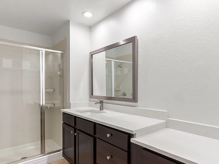 Bathrooms feature expansive countertops and thoughtfully designed layouts, offering generous space for effortless daily routines
