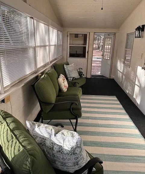 Sunroom is enclosed with windows with blinds to offer year round enjoyment. Furniture stays if renters request.