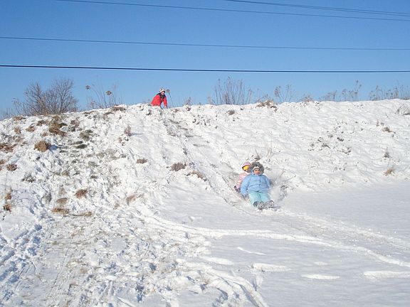 Sledding in Backyard