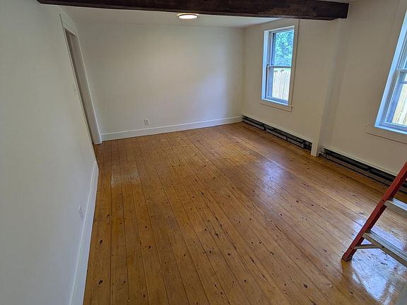 Primary bedroom with closet - completed - new ceilings, lights, and fresh paint.