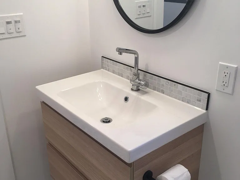 Modern bathroom with custom tile.