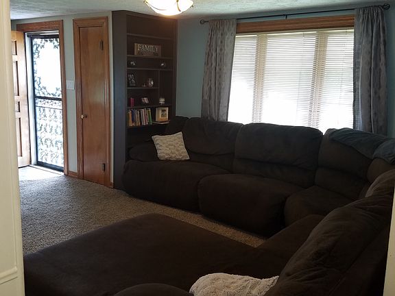 Living room with built-in sh