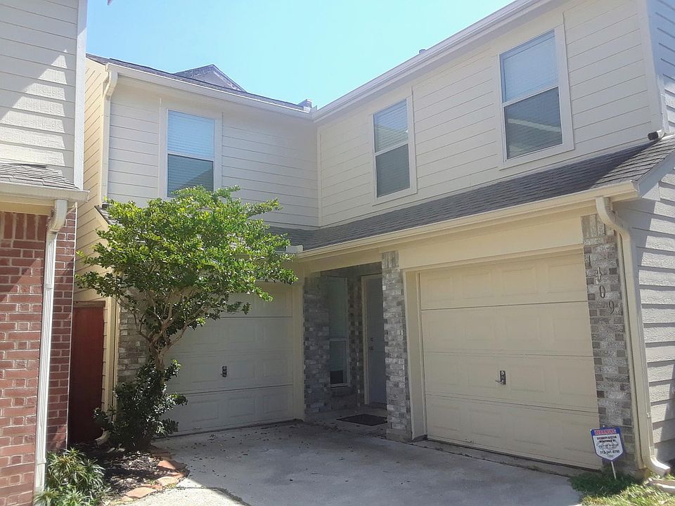 Front of house. Two one car garages. Washer/Dryer installed.