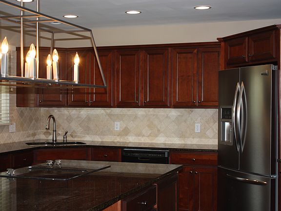Cherry cabinets.