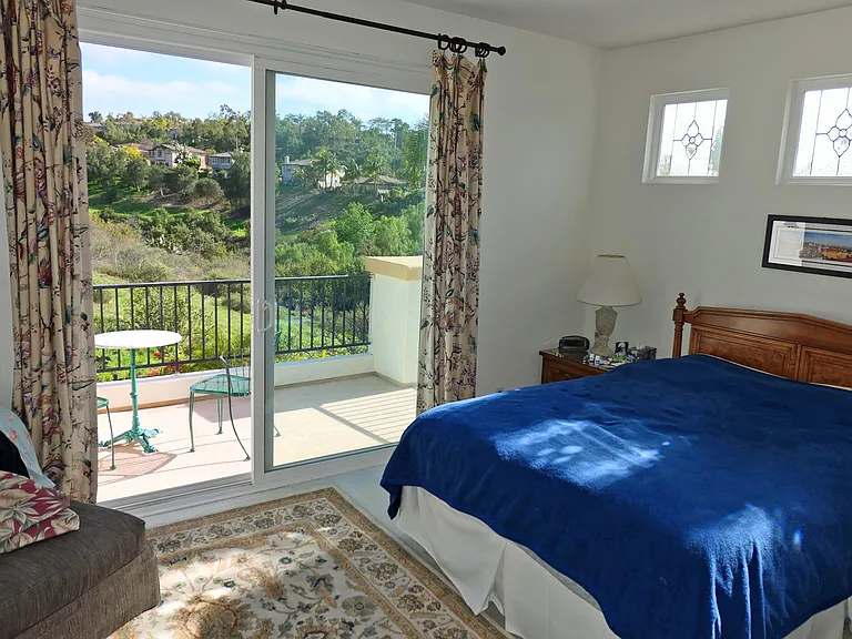 Patio bedroom with queen bed has a marvelous view, especially in early morning (faces south/southeast)