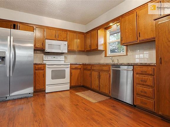 Kitchen - Refrigerator, Electric Stove and Dishwasher stay