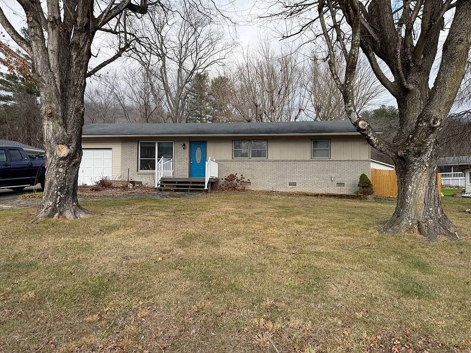 Exterior with one car garage. Comes with automatic garage door opener.