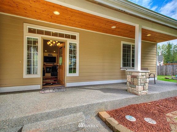 Inviting covered front porch to welcome guests.