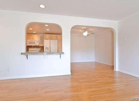 CUSTOM ARCHWAYS THROUGHOUT AND ROUNDED WALL CORNERS