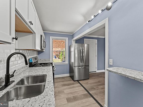3rd image of 3693 Kenyon Ave