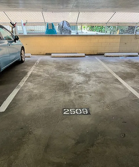 Large/covered, dedicated parking stall.