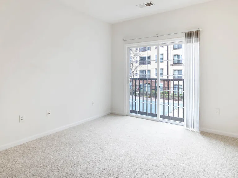 Carpeted Bedroom with Juliet Balcony
