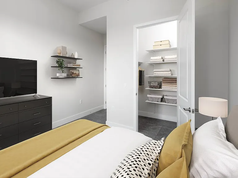 Signature Collection bedroom apartment with custom closet shelving system