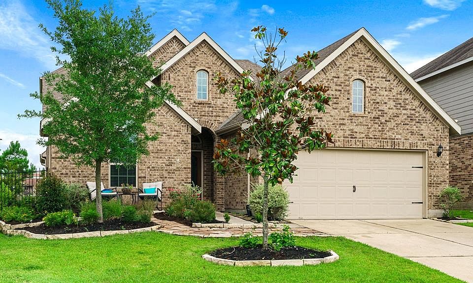 Gorgeous front elevation with updated landscaping - be ready to call this home!