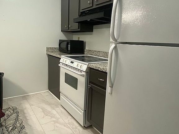 Kitchen with granite counter