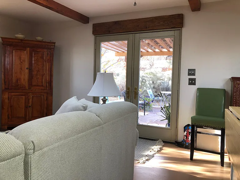TV in cabinet. 
Access to Patio