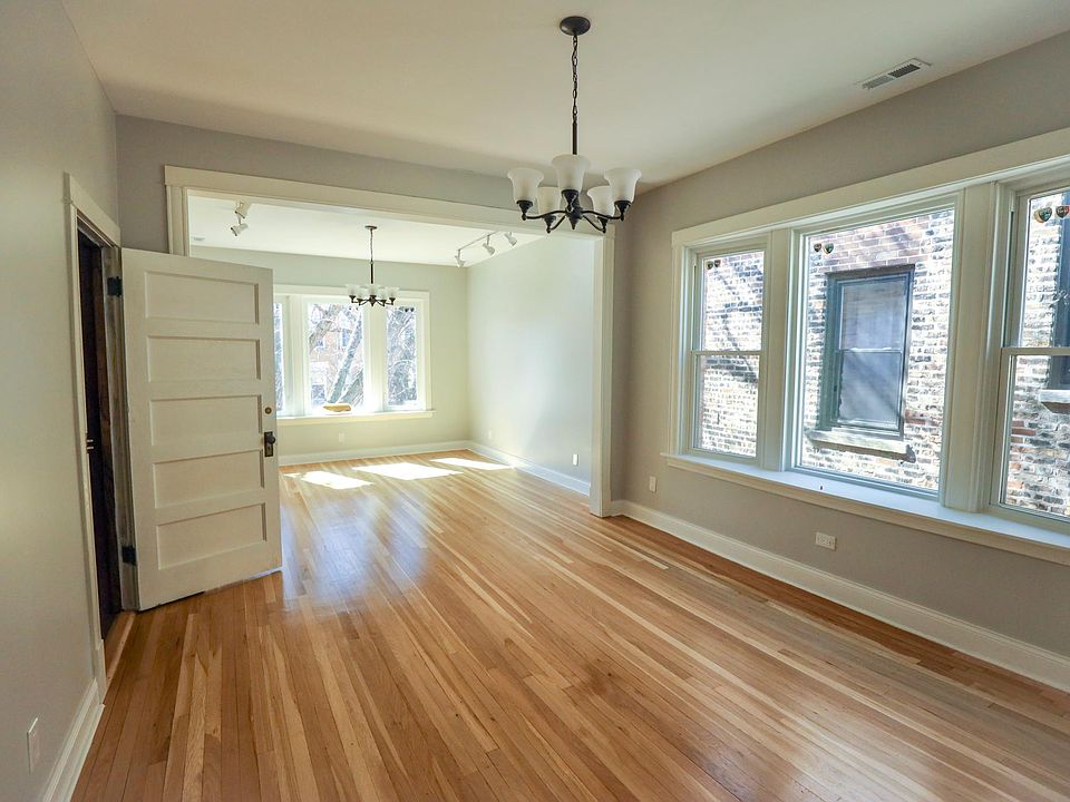 Sunny dining and living rooms with new windows