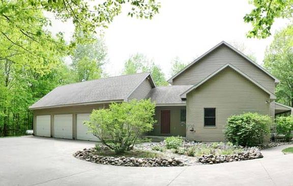 The three car garage offers protection from the elements and the loft above creates added storage. In the winter, enjoy jumping into a warm car because the garage is heated and insulated. 