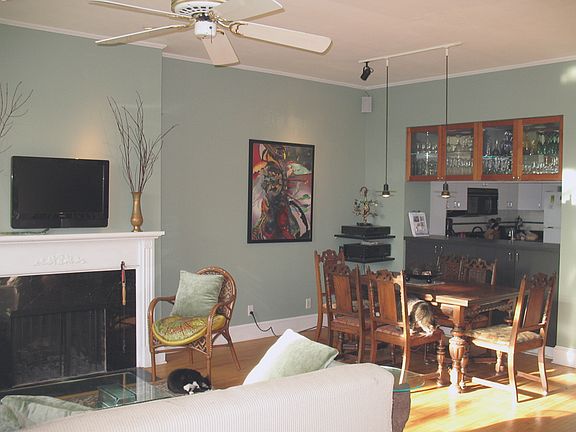 Living Room and dining area.
(The unit rents unfurnished.)