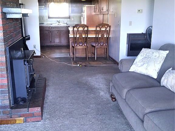 View of den and kitchen