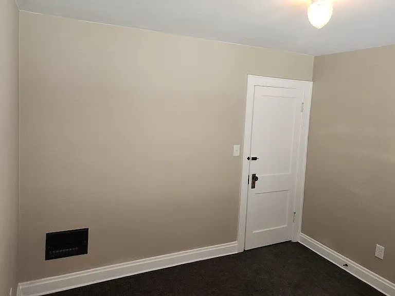 Middle bedroom, 10'5" x 9'10", new carpet, extra outlet installed, two windows, closet