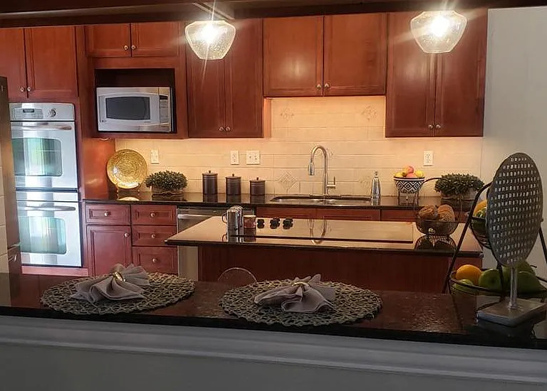 Pass-through eating bar from family room to kitchen