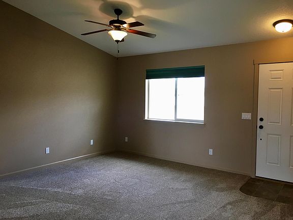 Living room looking towards street and front door.