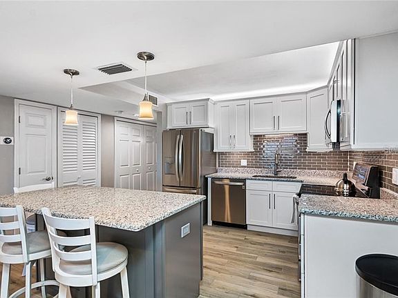 4th image of 7700 Sun Island Dr S APT 107