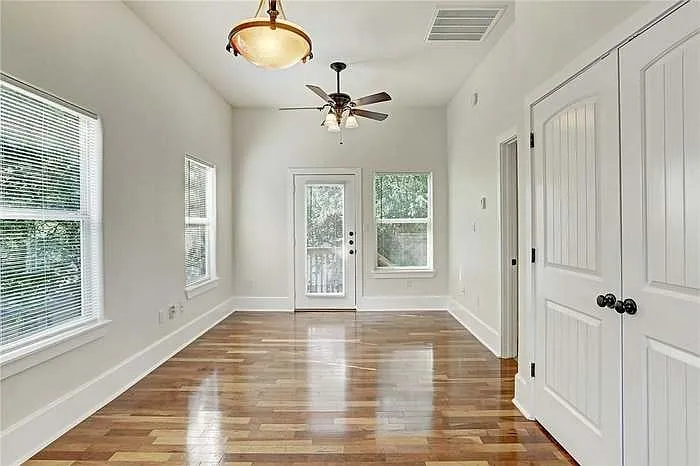 Living area w/ washer and dryer (in closet)