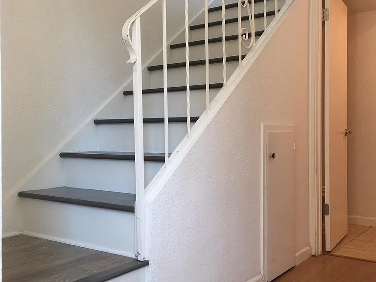 Stairway + Powder Room