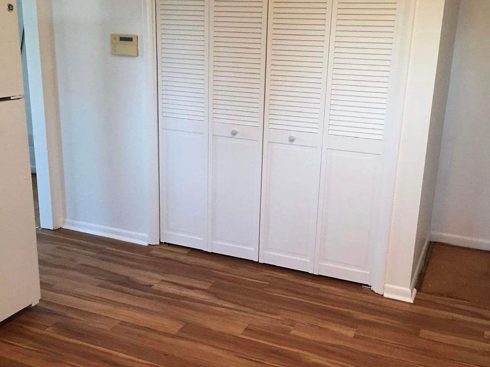 Kitchen and Utility Room. The utility room is behind the folding doors.