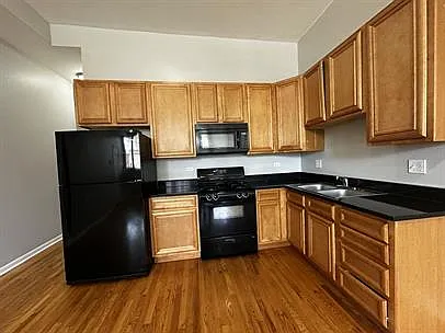 Building Photo - 2438 N Laramie Ave #1S
