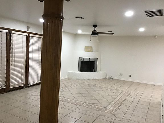 Open Family room, with french door over facing the swimming pool