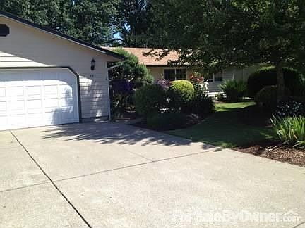 Front of House
						:
						Beautiful landscaped yard with plenty of shade trees. Large double car garage.