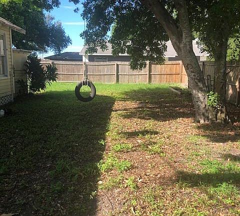 Large fenced side yard.
