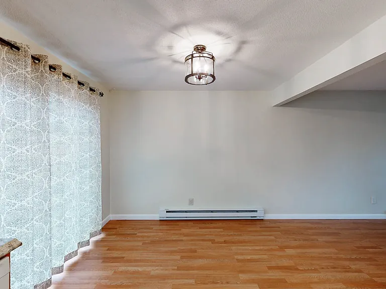 Modern & bright dining room with custom french doors to outside patio