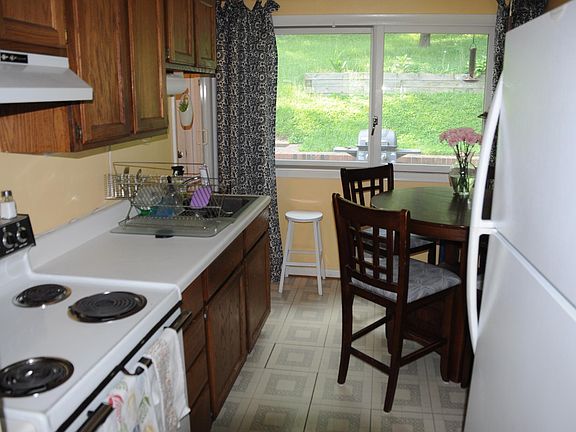Kitchen, before granite countertop, to show how it looks furnished.