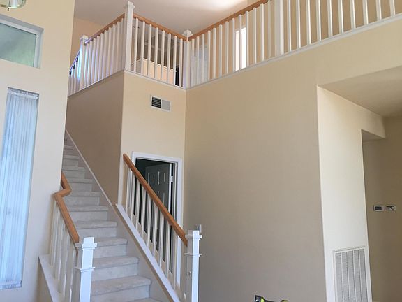 From living room looking upstairs