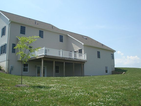 View from driveway of large deck