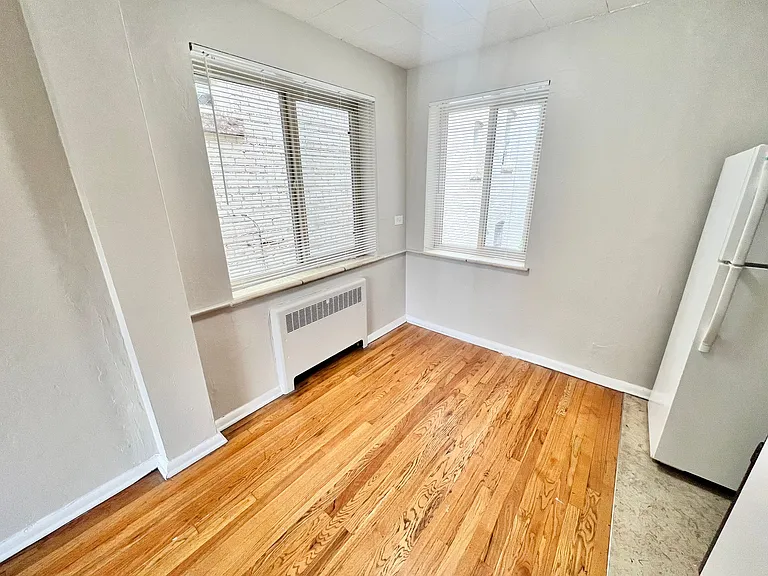 Enjoy natural light in this cozy corner, ideal for a small dining area. Enjoy natural light in this cozy corner, ideal for a small dining area.